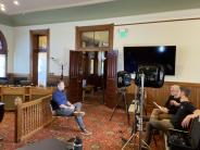 Mayor Faber being interviewed for a documentary about Edge Lane Roads