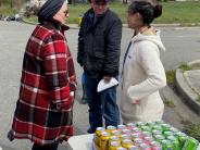 Council member Monica MickHagar and Public Works Director Steve King Talk with a Jefferson County Public Health Employee