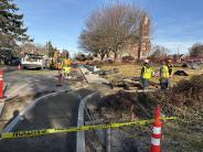 Sidewalk installation on Walker Street, in progress